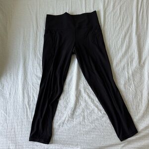 Athleta Salutation Stash 7/8 Tight Size Medium in Black